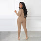 Einfarbiger nahtloser Jumpsuit mit halbem Reißverschluss