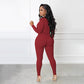 Einfarbiger nahtloser Jumpsuit mit halbem Reißverschluss