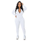 Einfarbiger nahtloser Jumpsuit mit halbem Reißverschluss