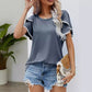 Lässiges Damen-T-Shirt mit Rundhalsausschnitt und Ärmeln mit Bommelbesatz