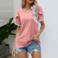 Lässiges Damen-T-Shirt mit Rundhalsausschnitt und Ärmeln mit Bommelbesatz
