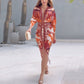 Elegantes, figurbetontes Kleid mit V-Ausschnitt und Print für Damen